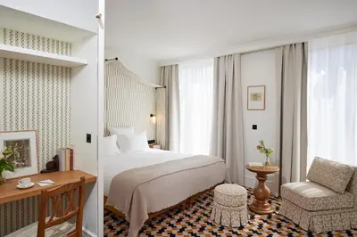Un ou plusieurs lits dans un hébergement de l'établissement Hôtel Noucha