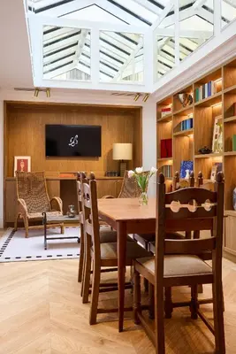 Télévision ou salle de divertissement dans l'établissement Hôtel Noucha