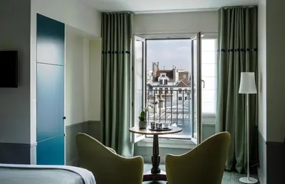 Un ou plusieurs lits dans un hébergement de l'établissement Hôtel Parc Saint-Séverin - Esprit de France