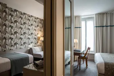 Un ou plusieurs lits dans un hébergement de l'établissement Hôtel Parc Saint-Séverin - Esprit de France