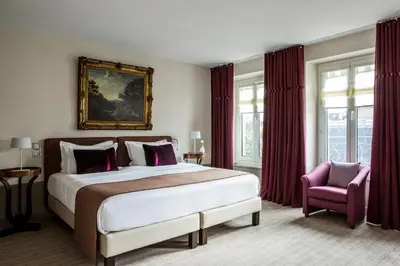 Un ou plusieurs lits dans un hébergement de l'établissement Hôtel Parc Saint-Séverin - Esprit de France