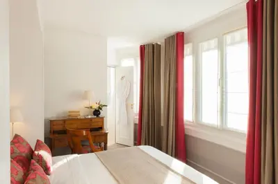 Un ou plusieurs lits dans un hébergement de l'établissement Hôtel Parc Saint-Séverin - Esprit de France