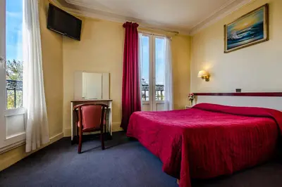 Un ou plusieurs lits dans un hébergement de l'établissement Avenir Hotel Montmartre