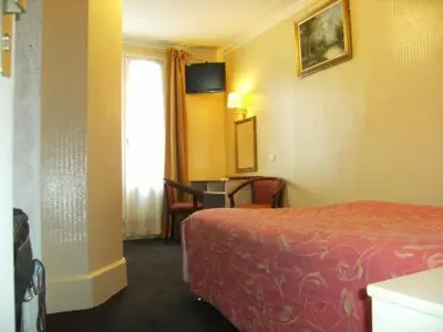 Un ou plusieurs lits dans un hébergement de l'établissement Avenir Hotel Montmartre