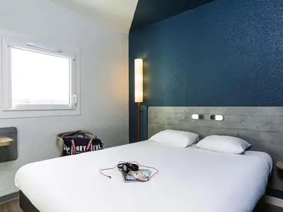 Un ou plusieurs lits dans un hébergement de l'établissement ibis budget Paris Porte d'Italie Est