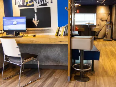 Télévision ou salle de divertissement dans l'établissement ibis budget Porte D'Orleans