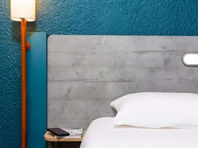 Un ou plusieurs lits dans un hébergement de l'établissement ibis budget Porte D'Orleans