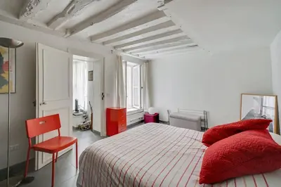 Un ou plusieurs lits dans un hébergement de l'établissement Saint Germain dès Pres Paris VI° - Unit 003