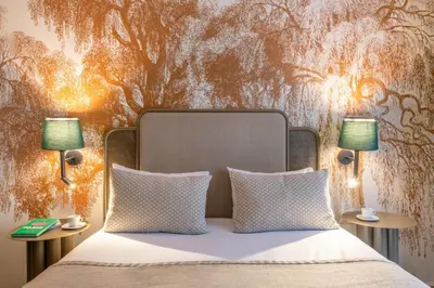 Un ou plusieurs lits dans un hébergement de l'établissement Hotel Avalon Paris