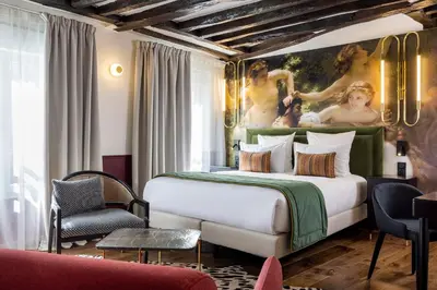 Un ou plusieurs lits dans un hébergement de l'établissement Hotel Louis II