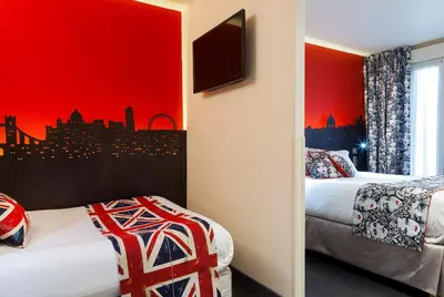 Un ou plusieurs lits dans un hébergement de l'établissement Hôtel Aurore Paris Gare de Lyon