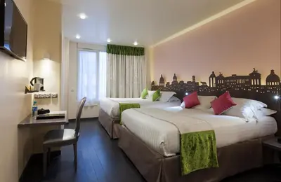 Un ou plusieurs lits dans un hébergement de l'établissement Hôtel Aurore Paris Gare de Lyon