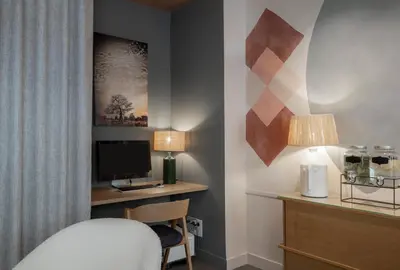 Télévision ou salle de divertissement dans l'établissement Hôtel Marais de Launay