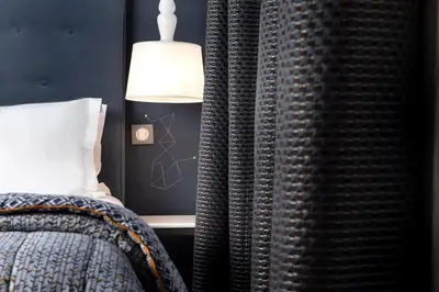 Un ou plusieurs lits dans un hébergement de l'établissement Hôtel Marais Hôme