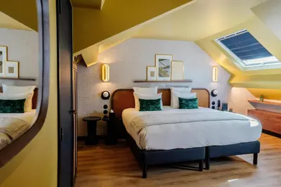 Un ou plusieurs lits dans un hébergement de l'établissement Hôtel Riesner