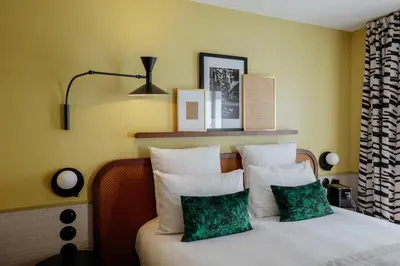 Un ou plusieurs lits dans un hébergement de l'établissement Hôtel Riesner