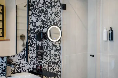 Salle de bains dans l'établissement Hôtel Riesner