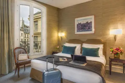 Coin salon dans l'établissement Hôtel Delavigne
