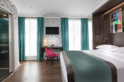 Un ou plusieurs lits dans un hébergement de l'établissement Vendôme Opera Hotel