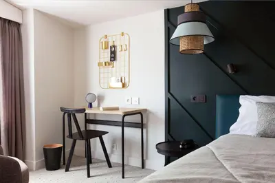 Un ou plusieurs lits dans un hébergement de l'établissement Hotel Bastille Speria