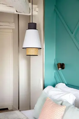 Un ou plusieurs lits dans un hébergement de l'établissement Hotel Bastille Speria