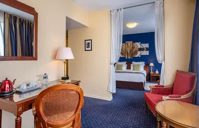 Coin salon dans l'établissement Amiral Hôtel