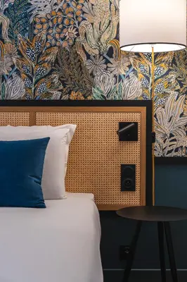 Un ou plusieurs lits dans un hébergement de l'établissement Hôtel Mercure Paris Boulogne Pont de Saint Cloud