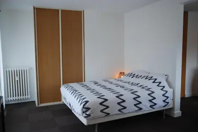 Un ou plusieurs lits dans un hébergement de l'établissement Appartements Paris Boulogne