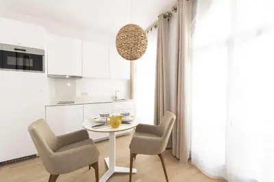 Cuisine ou kitchenette dans l'établissement Candide