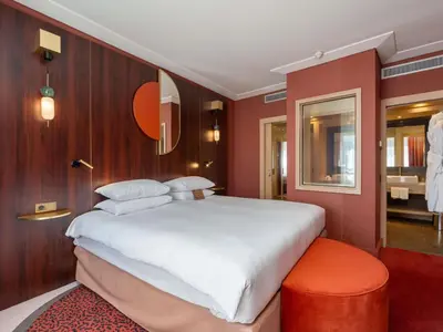 Un ou plusieurs lits dans un hébergement de l'établissement Nest Hotel Paris la Défense - MGallery Collection