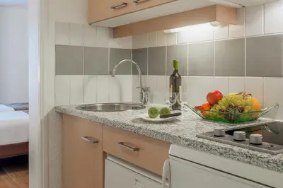 Cuisine ou kitchenette dans l'établissement Citadines Bastille Gare de Lyon Paris