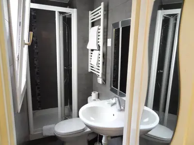 Salle de bains dans l'établissement Amélie Hotel