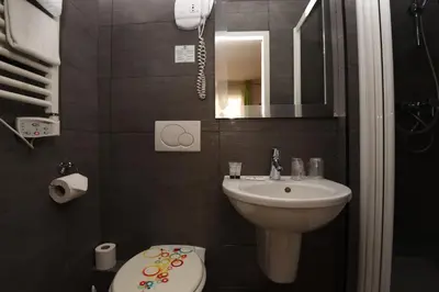 Salle de bains dans l'établissement Amélie Hotel