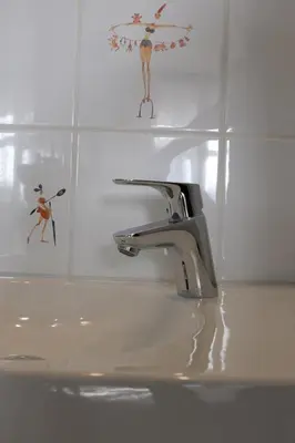 Salle de bains dans l'établissement Amélie Hotel