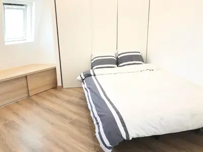 Un ou plusieurs lits dans un hébergement de l'établissement Élégance Haussmanienne, studio moderne et cosy