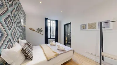 Un ou plusieurs lits dans un hébergement de l'établissement 126 Suite Abraham - Superbe Appartement à Paris