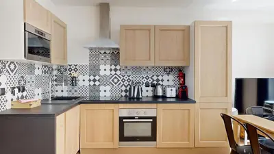 Cuisine ou kitchenette dans l'établissement 126 Suite Abraham - Superbe Appartement à Paris