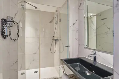 Salle de bains dans l'établissement Hotel Eiffel Petit Louvre