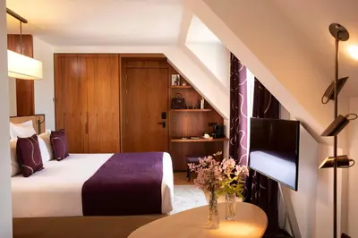 Un ou plusieurs lits dans un hébergement de l'établissement Hotel Maison FL
