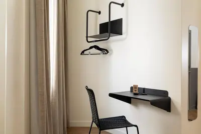 Télévision ou salle de divertissement dans l'établissement Hôtel Korner Etoile