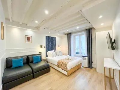 Un ou plusieurs lits dans un hébergement de l'établissement 93 - Luxury Flat in Le Marais
