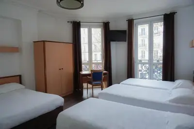 Un ou plusieurs lits dans un hébergement de l'établissement Hôtel Liège Strasbourg