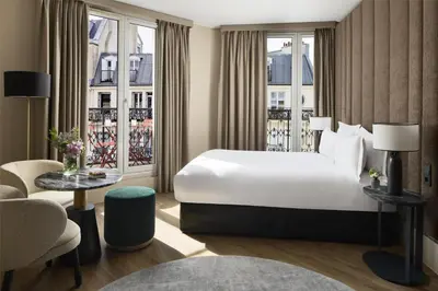 Un ou plusieurs lits dans un hébergement de l'établissement NH Paris Opéra Faubourg