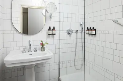 Salle de bains dans l'établissement NH Paris Opéra Faubourg