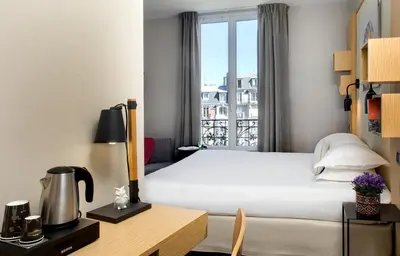 Un ou plusieurs lits dans un hébergement de l'établissement Chouette Hotel