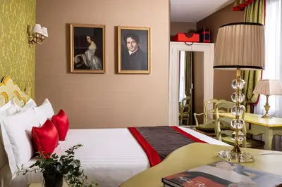 Un ou plusieurs lits dans un hébergement de l'établissement Hotel De Seine