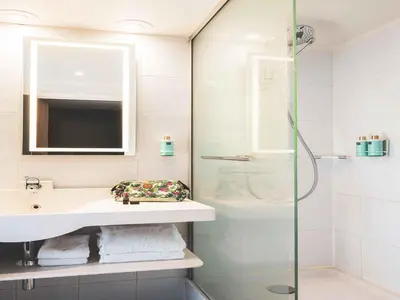 Salle de bains dans l'établissement Novotel Paris Vaugirard Montparnasse