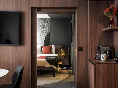 Un ou plusieurs lits dans un hébergement de l'établissement Novotel Paris Vaugirard Montparnasse