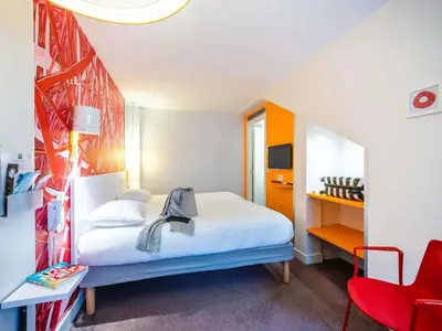 Un ou plusieurs lits dans un hébergement de l'établissement ibis Styles Paris La Défense Courbevoie