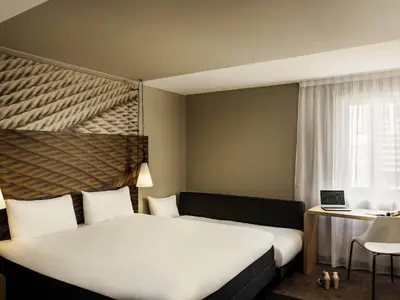 Un ou plusieurs lits dans un hébergement de l'établissement ibis Paris Place d’Italie 13ème